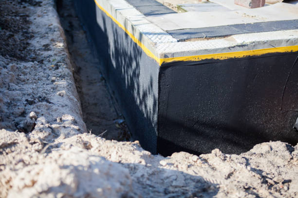 Professional Waterproofing technician working in Totowa, NJ